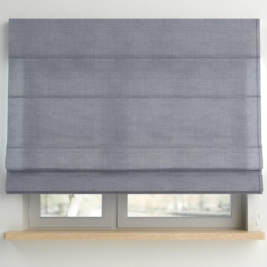 gray semi-transparent roman shades . Almost completely closed. White window and wooden window sill. 